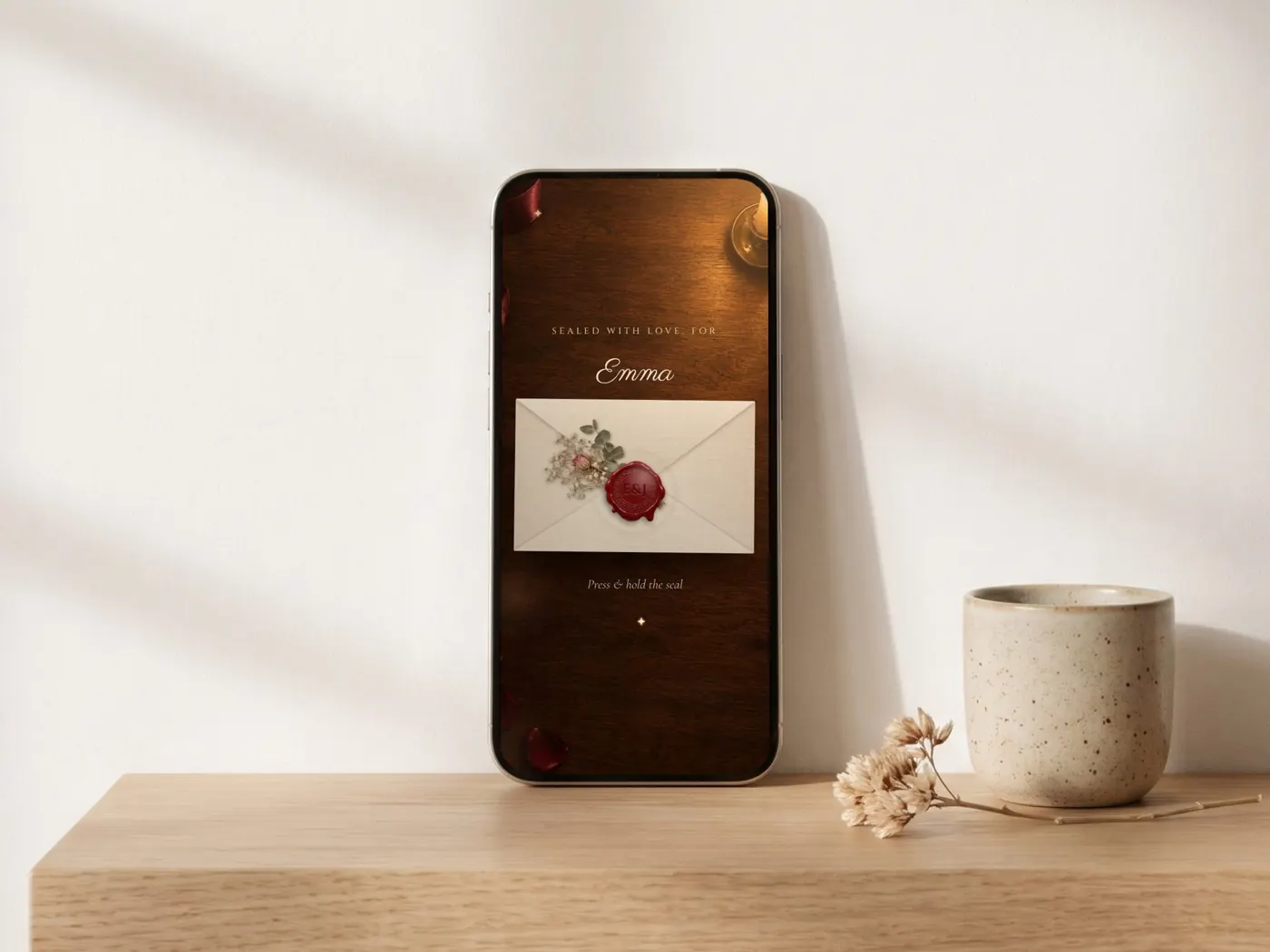 An animated love letter open on a phone on a wooden shelf